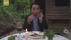 Chinese food vlogger "Wild Cooking" is a man of many talents. He's a carpenter, cook, and sommelier all rolled into one. In the first episode of his eponymous series on CGTN, we see how he turns wood into furniture and prepare a fancy dinner in the forest before pairing it with his beverage choice and enjoying the meal with an unannounced guest. | CGTN