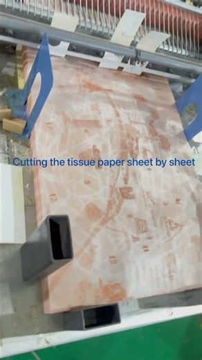 Cutting the tissue paper sheet by sheet