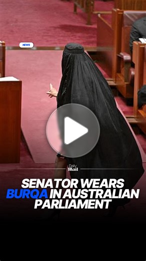 The Australian Senate has descended into chaos after the leader of the right-wing One Nation party entered the chamber wearing a burqa. Pauline Hanson was seeking to introduce a bill that would ban full face coverings in Australia - a policy she has campaigned on for decades. Just minutes after other lawmakers blocked her from introducing that bill, she returned wearing a black burqa and floral dress that cut off above the knee. | Daily Mail Australia