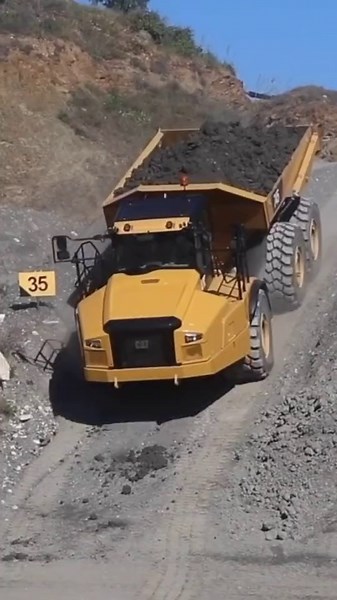 Automatic Traction Control in Articulated Dump Truck by Caterpillar