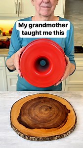 Jeff’s mom shows us an easy way to fold parchment paper to fit a tube pan #bakingtips #bakingfromscratch #angelfoodcake #parchmentpaper | Liz & Jeff