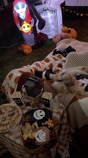 Emily Welch | Cozy Home & Life | Nightmare Before Christmas movie night #ad with @disneyfamily 🎃🍿🎬💀 How fun are these Jack and Sally inflatables? Perfect by themselves as... | Instagram