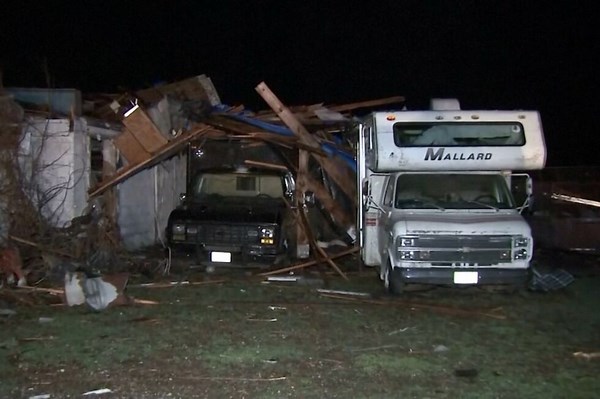 Severe storms whip up tornadoes in Illinois and Indiana, leveling homes