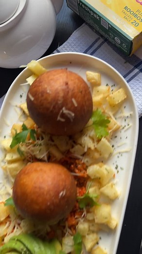 African breakfast but make it fancy!! Fermented flour balls served on a bed of garlic infused mango salad with potatoe cubes 😮‍💨🤤🤤🤤 Garnished with hard cheese from @woolworths_sa Served with rooibos from @freshpakrooibos ! Unfortunately I haven’t mastered the art of making Magwinya yet. The ratio of yeast and flour throws me off sometimes! For this particular video I used an easymix from @breadboxbakery_studio . Happy weekend and have a good one! Beside rooibos? What is your preferred drink
