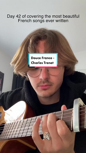 Male French Student Sings Poetic French Song 'Douce France' by Charles Trenet