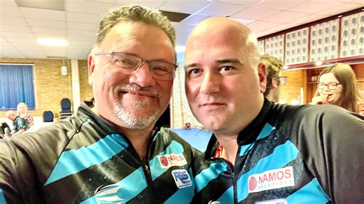 Rob Cross wearing special badge after throwing darts helped save relative's life