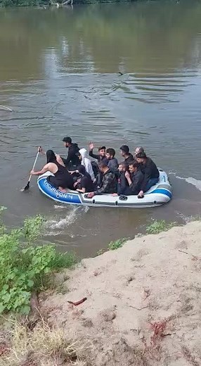 Rowing Adventure on the River in Inflatable Boat