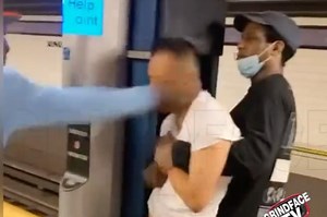 Video shows men holding down, beating Asian man in NYC subway station