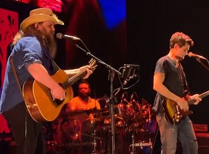 Remember When Chris Stapleton and John Mayer Shocked Nashville With A “Slow Dancing In a Burning Room” Duet?