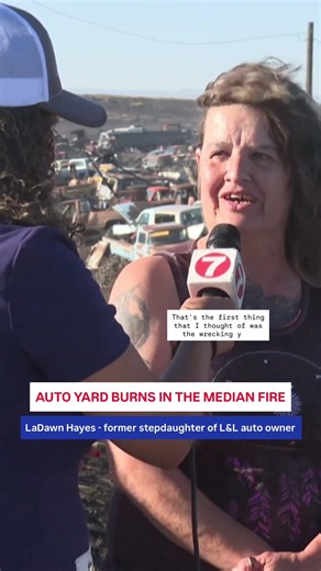 Median fire burns local auto yard