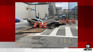 Massive sinkhole in downtown Cleveland nearly swallows car