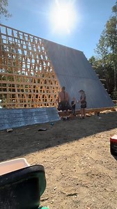Installing a tin roof off-grid: 10% building, 90% chasing screws I dropped in the grass 😂🪛 #offgridproblems #offgrid #offgridlife #tinroof #roofinstall #diybuild #cabinlife #buildtok #homesteadtok #fyp | Shannon N Chad