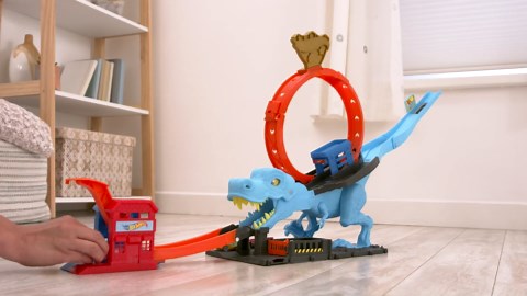 Hot Wheels City Track Set with 1 Toy Car, Race Through a Giant Loop to Defeat a Big Dinosaur, T-Rex Loop Stunt and Race Playset
