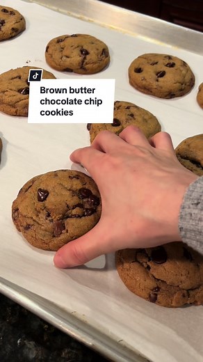 Brown butter chocolate chip cookies🍪 This is one of my go-to cookie recipes from @Tessa Arias This recipe makes me 20-25 large cookies: “Toast” 1 cup (227 grams) of unsalted butter in a small pan on the stove until it browns. Pour that into a large bowl and add: 1/2 (100 grams) cup granulated sugar 1 1/4 cups (250 grams) lightly packed dark brown sugar. Set this butter and sugars mixture aside to cool down while you prepare your dry ingredients. In a separate small bowl, mix together: 1 1/2 cup