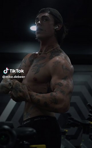 Showcase of a Muscular Fitness Model with Tattoos
