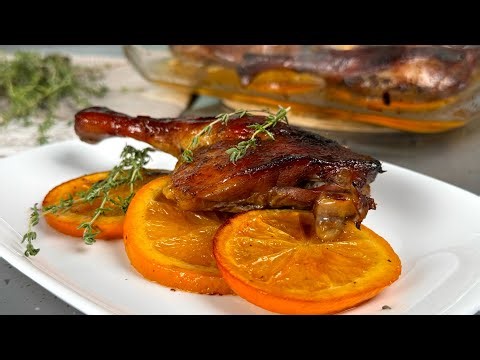 Juicy oven-baked duck with oranges. Duck legs — very tasty, tender, and juicy.