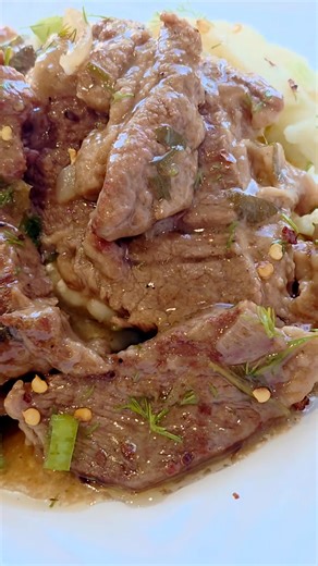 Sofrito from Corfu Greece. Today Saturday and Promotinal $18... TENDER TENDER TENDER is The All New Corfu slow-braised beef in rich white wine vinegar, fresh garlic, onion, parsley and white wine served over Greek-Style mashed potatoes w/Greek Feta, melt-in-your-mouth perfection! Come get a dish and taste the authenticity of Greek Cuisine and the All natural and organic ingredients that our chefs prepare all our dishes at The Greek. Served with our hot pita and if you wish make it a complete din