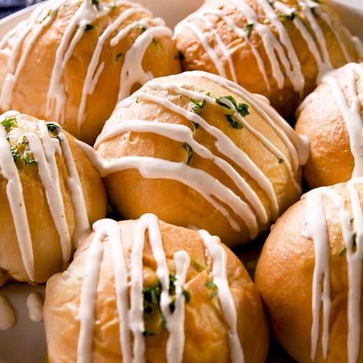 Buffalo Chicken Ranch Bombs will be your new favorite thing to do with biscuit dough. Full recipe: http://dlsh.it/KppO57S | Delish