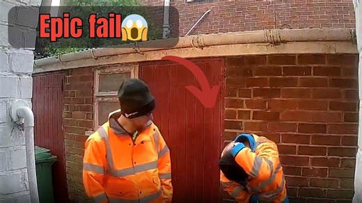 Worker slips on an improvised ramp and takes a fall