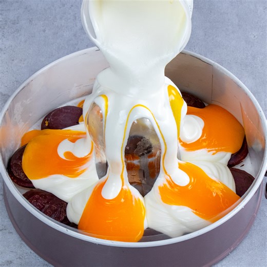 Simply amazing! Cake made of Jaffa biscuits and a bottle. Without baking! Ingredients: Jaffa biscuits - 300 g (10.6 oz) for the cheese cream: cream cheese - 300 g (10.6 oz) powdered sugar - 120 g (4.23 oz) whipping cream - 200 ml (6.76 fl oz) for the tangerines cream: tangerines - 150 g (5.3 oz) orange juice - 150 ml (5.07 fl oz) starch - 20 g (0.7 oz) water - 30 ml (1 fl oz) Tray diameter 23 cm (9 in) IN THE FRIDGE 3 H melted dark chocolate - 200 g (7 oz) Jaffa biscuits - 200 g (7 oz) | Cookrat