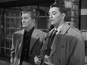 Out of the Past 1947 Out of the Past (billed in the United Kingdom as Build My Gallows High) is a 1947 American film noir directed by Jacques Tourneur and starring Robert Mitchum, Jane Greer, and Kirk Douglas. The film was adapted by Daniel Mainwaring (using the pseudonym Geoffrey Homes) from his 1946 novel Build My Gallows High (also written as Homes), with uncredited revisions by Frank Fenton and James M. Cain. Its complex, fatalistic storyline, dark cinematography, and classic femme fatale ga