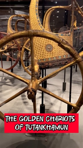 The Golden Chariots of Tutankhamun This image reveals the gilded war chariots of the ancient Egyptian king Tutankhamun, masterpieces that combine military power, royal symbolism, and extraordinary craftsmanship. These chariots are currently displayed in the Grand Egyptian Museum, where they stand as some of the most striking objects from the king’s burial equipment. The chariots were discovered in 1922 inside Tomb KV62 in the Valley of the Kings by British archaeologist Howard Carter. They are p