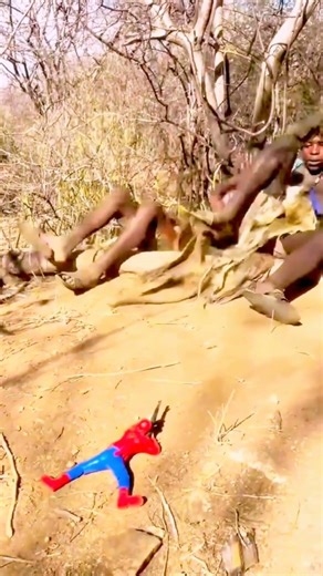 “Spider-Man Doll Gets Shot, Hadzabe Man Freaks Out 🤣” #hadzabeculture #funnyvideo #spaiderman