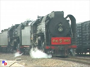Big Steam and some operational practices on the Ji Tong Railway in inner Mongolia during 2003. From the Highball Productions show "Big Steam’s Last Stand – Winter on Jingpeng Pass" https://rfd.video/Jingpeng | Steam Giants