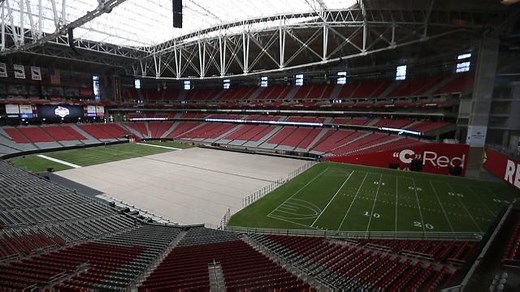 Grass field rolls in at University of Phoenix Stadium