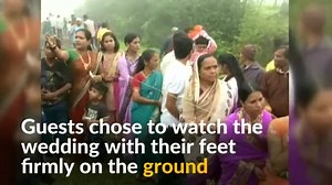 111K views · 544 reactions | An Indian couple dangles above a gorge as they exchange wedding vows. | Reuters | Facebook