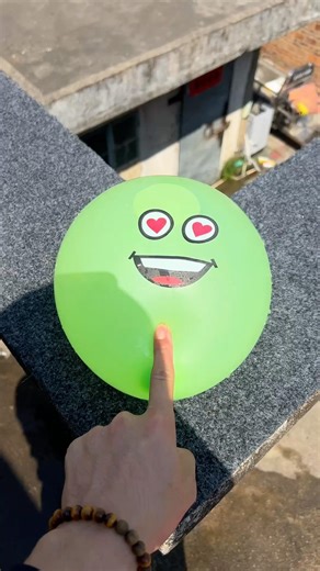 Experiment: Will a water balloon explode if it rolls down a tall building? 💥🎈 #balloon