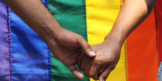 How has the Pride rainbow flag evolved to represent the LGBTQ  movement?