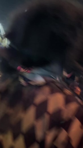 Colorful Night Event with Clown Costume Display