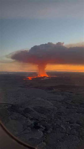 Stunning Aerial View of a Volcanic Eruption at Sunset