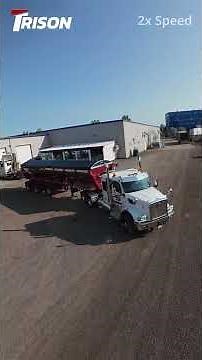 A Trout River Livebottom Trailer with a New Trison Electric Side Lok Tarp System