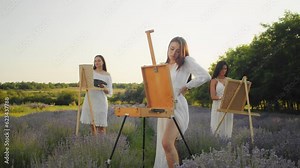 A young girl, surrounded by the summer splendor of a lavender field, expresses her artistic nature through drawing, bringing the vibrant colors of the scene to life on paper.
