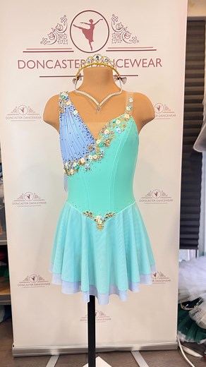 Such a pretty ballet dress in pastel blue and mint ❤️The asymmetric pleated mesh detail carries over the shoulder to create a floaty scarf at the back. Embellished with gold appliqué, crystals and flower details . . . . #balletdresses #classicalballet #classicalballettutu #ballettutu #ballettutus #balletdress #yagp #tutu #tutus #allenglanddance #englishballetchamps #structuredtutu #royalballet #danceworldcup #tutusofinstagram #professionaltutu #prixdelausanne #tutumaker #tutusforsale #principald