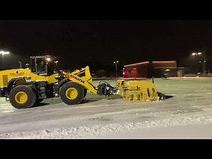 Komatsu loader Plowing Snow with Metalpless plow
