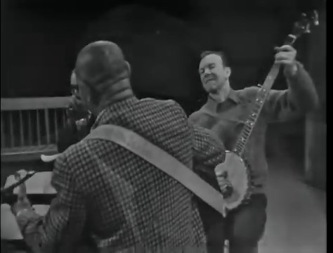 Brownie McGhee, born on this day in 1915 in Knoxville, Tennessee. Here he is in 1966 performing "Key to the Highway" with Sonny Terry on harmonica and Pete Seeger on banjo. | Dust-to-Digital