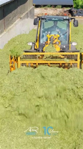 TM320S bossing the silage pit