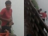 Horrifying moment young men fall off cliff in India after drinking