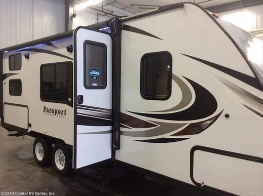 Bring family and friends along when you travel with this 2018 Keystone RV Passport Ultra Lite Express 239ML! This fifth wheel can accommodate up to 8 people with the double bunks, booth dinette, and Murphy bed it has to offer! Click here to see: https://goo.gl/1wR4kS | Capital RV of Bismarck