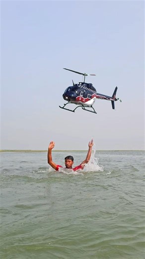 The helicopter was passing fish in the river