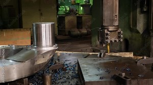 Industrial remote CNC control panel of machinery with different buttons. Process of cutting metal at factory