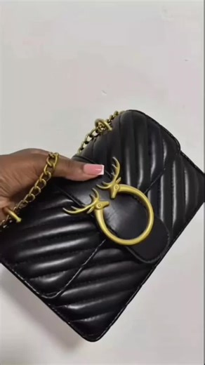 Elegant, bold, and oh-so-chic! ✨ This black beauty with deer detailing is a must-have. 🖤🦌 #TimelessStyle #SublimeBeauty