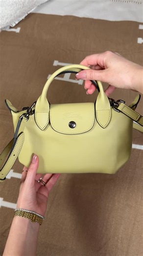 Jessica Linn on Instagram: "I’m calling it, this is the it bag for spring 💚 Comment BAG & I’ll dm you the link! Unboxing my new Longchamp Le Pliage Xtra 😍 this is the Le Pliage in all leather instead of nylon and she is a beauty. This is the extra small size in the color pistachio which is the perfect shade of pastel green for spring and summer 💚 Comment BAG below to receive a DM with the link to this post on my LTK ⬇ https://liketk.it/5MvEO #longchamp #lepliage #longchamplepliage"