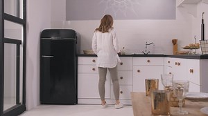 Pregnant woman in the kitchen - Free Stock Video
