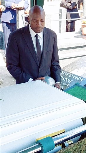 In a deeply moving farewell, the casket of Kennedy Hans Elifas was lowered into its final resting place as mourners sang heartfelt hymns. Resting atop the casket was his favourite hat—a touching symbol of the life he lived and the memories he leaves behind. 🕊️ Rest in eternal peace, Kennedy Hans Elifas. 🎥 Reels by Team Drew Films #KennedyHansElifas #FinalFarewell #RestInPeace #InLovingMemory #FuneralService