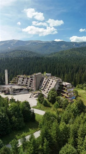 Frozen in time, scarred by history. This haunting shell was once Architect Ahmed Džuvić’s modern marvel: the Olympic Hotel, built for the 1984 Sarajevo Winter Games. A symbol of global unity and sporting pride, it welcomed the world in 1982. Just a decade later, it was gutted by fire during the 1990s conflict. Now, it stands as a powerful international monument—a stark reminder of how quickly peace can fracture and how enduring the wounds of war can be. From celebration to devastation, its concr
