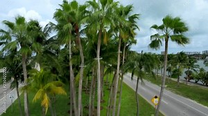 Shot of Welcome to Miami sign that ends with aerial view of Miami Beach